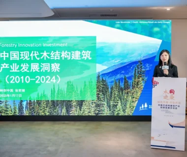 Forestry Innovation Investment China representative Stephanie Zhang presents findings from a report on the development of China's modern timber construction industry at an industry event.